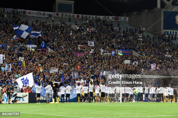 Japanese players and staffs and fans celebrate their 2-0 victory and qualified for the FIFA World Cup Russia after the FIFA World Cup Qualifier match...