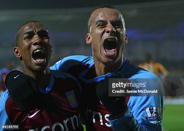 Ashley Young and Gabriel Agbonlahor of Aston Villa celebrate after Kamil Zayatte of Hull City scored an own goal during the Barclays Premier League...