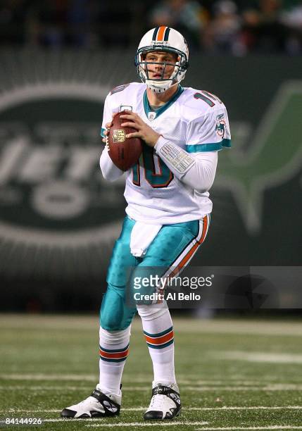 Chad Pennington of The Miami Dolphins looks to pass against the New York Jets during their game on December 28, 2008 at Giants Stadium in East...