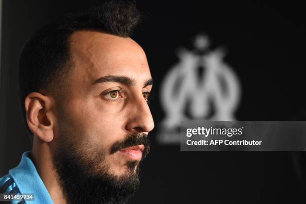 Marseille's newly recruited Greek forward Konstantinos Mitroglou attends his official presentation at the Robert-Louis Dreyfus training centre in...