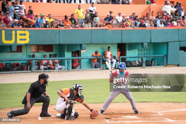 Cuban Baseball National Series in the Sandino stadium of Santa Clara city. Teams Ciego de Avila against the local Villa Clara .