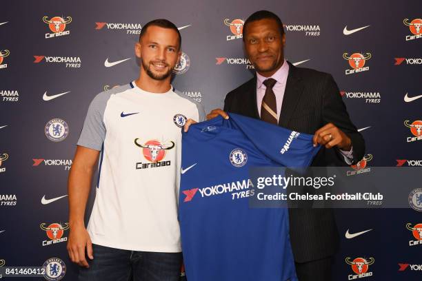 Danny Drinkwater poses with technical director Michael Emenalo as he is unveiled as a new signing for Chelsea FC, on August 31, 2017 in Cobham,...