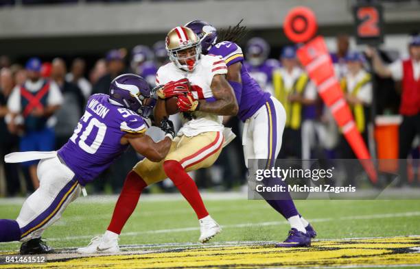 Louis Murphy of the San Francisco 49ers makes a reception during the game against the Minnesota Vikings at U.S. Bank Stadium on August 27, 2017 in...