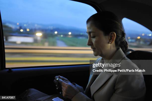 Upon arriving by plane in Brazil, Ingrid Betancourt changes the time on her watch on December 5, 2008. Brazil is one of the stops on her tour across...