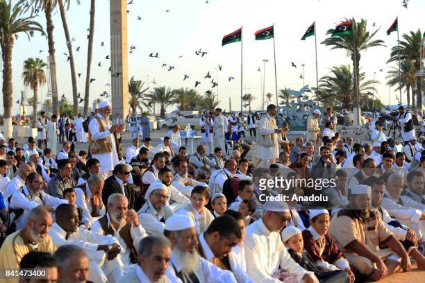 Muslims gather to perform the Eid Al-Adha prayer at Martyrs Square in Tripoli, Libya on September 01, 2017. Muslims worldwide celebrate Eid Al-Adha,...