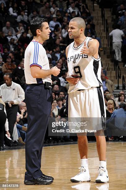 Tony Parker of the San Antonio Spurs argues a call with referee Zach Zarba during the game against the Sacramento Kings at AT&T Center on December...