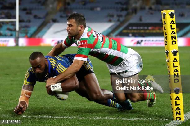 Semi Radradra of the Eels scores a try during the round 26 NRL match between the Parramatta Eels and the South Sydney Rabbitohs at ANZ Stadium on...