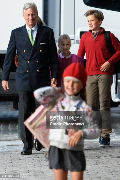 Brussels, Belgium - -September 1, 2017: King Philippe brings to school Sint Jans Berchmans his children Princesses Elisabeth , Eléonore and Gabriel