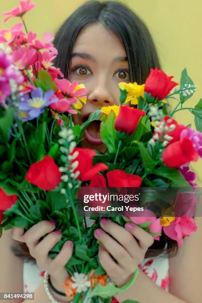 teenager with flowers - ot coruña fotografías e imágenes de stock