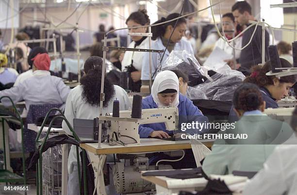 Tunisie-industrie-tourisme-crise-UE, Tunisian women sew products at the "Prodite" textile company in Tunis, on December 30, 2008. The production is...