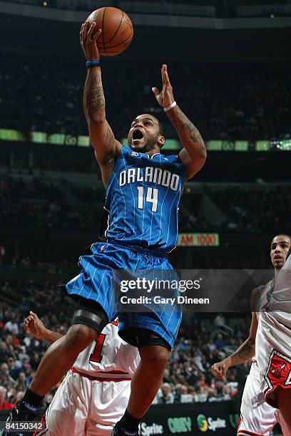 Jameer Nelson of the Orlando Magic shoots a layup against the Chicago Bulls at the United Center December 31, 2008 in Chicago, Illinois. NOTE TO...