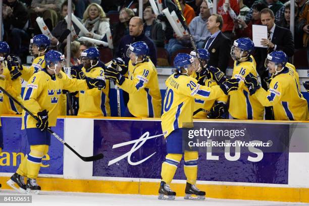 Andre Petersson of Team Sweden celebrates his first period goal against Team Russia during the IIHF World Junior Championships at the Ottawa Civic...