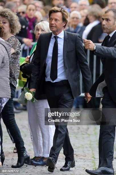 Laurent Delahousse attends Mireille Darc's Funerals at Eglise Saint-Sulpice on September 1, 2017 in Paris, France.