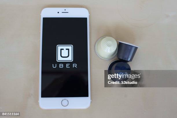 The startup screen of Uber, car transportation mobile app developed by the American technology company Uber Technologies Inc, pictured on the display...