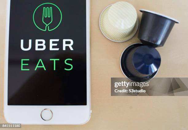The startup screen of UberEATS, a food delivery mobile app developed by the American technology company Uber Technologies Inc, pictured on the...