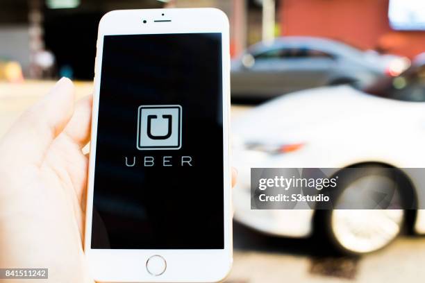 The startup screen of Uber, car transportation mobile app developed by the American technology company Uber Technologies Inc, pictured on the display...