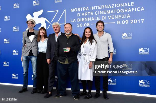 Niels Pagh Andersen, Diane Weyermann, Christopher Doyle, Ai Weiwei and guests attend the 'Human Flow' photocall during the 74th Venice Film Festival...