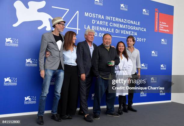 Niels Pagh Andersen, Diane Weyermann, Christopher Doyle, Ai Weiwei and guests attend the 'Human Flow' photocall during the 74th Venice Film Festival...