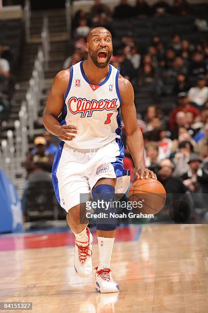 Baron Davis of the Los Angeles Clippers reacts while bringing the ball up the court against the Philadelphia 76ers at Staples Center on December 31,...