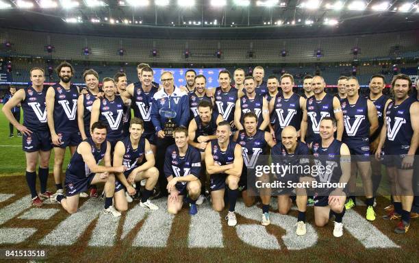 Victoria pose with the trophy after winning the 2017 EJ Whitten Legends Game between Victoria and the All Stars at Etihad Stadium on September 1,...