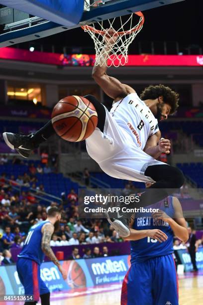 Belgium's Jean Marc Nwema scores next to Great Britain's Luke Nelson during the FIBA Eurobasket 2017 men's group D basketball match between Belgium...