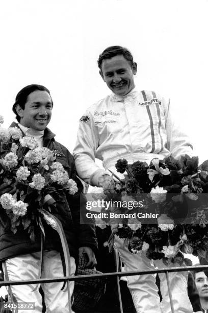 Bruce McLaren, PedroRodriguez, Grand Prix of Belgium, Spa Francorchamps, 09 June 1968. Winner Bruce McLaren with Pedro Rodriguez on the podium.