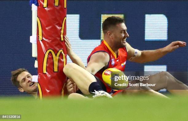 Nick Dal Santo of Victoria crashes into the post during the 2017 EJ Whitten Legends Game between Victoria and the All Stars at Etihad Stadium on...
