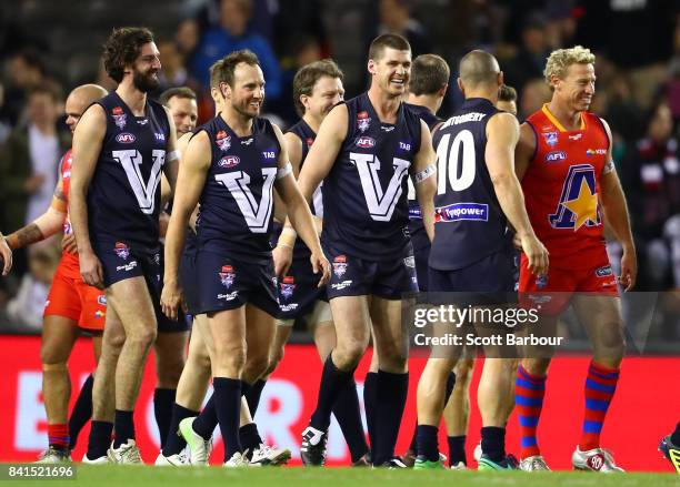 Jonathon Brown of Victoria celebrates wth his teammates after kicking the match winning goal after the siren during the 2017 EJ Whitten Legends Game...