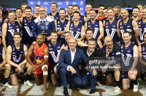 Victoria and the All Stars pose for a photo with Ted Whitten Junior after the 2017 EJ Whitten Legends Game between Victoria and the All Stars at...