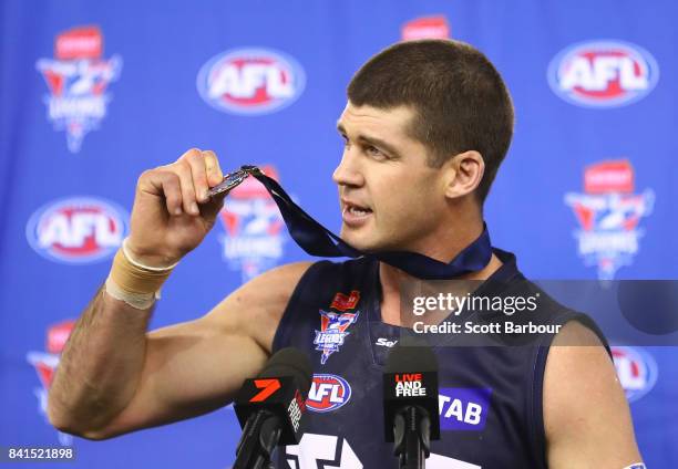 Best on ground Jonathan Brown of Victoria receives his medal after the 2017 EJ Whitten Legends Game between Victoria and the All Stars at Etihad...