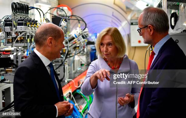 German Education and Research Minister Johanna Wanka chats with Mayor of Hamburg Olaf Scholz and European XFEL Managing Director Robert Feidenhans'l...