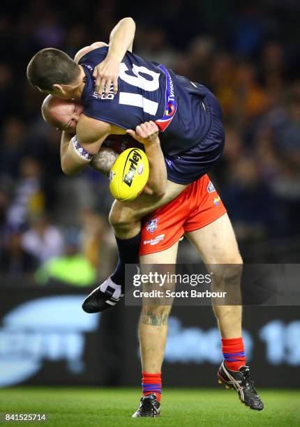 Jonathon Brown of Victoria and Daniel Southern of the All Stars compete for the ball during the 2017 EJ Whitten Legends Game between Victoria and the...