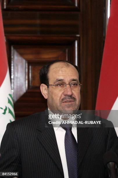 Iraqi Prime Minister Nuri al-Maliki delivers a speech inside the former palace of ousted dictator Saddam Hussein inside the Green Zone in Baghdad on...