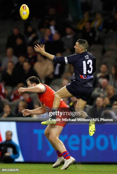 Adem Yze of Victoria marks the ball over Brian Lake of the All Stars during the 2017 EJ Whitten Legends Game between Victoria and the All Stars at...