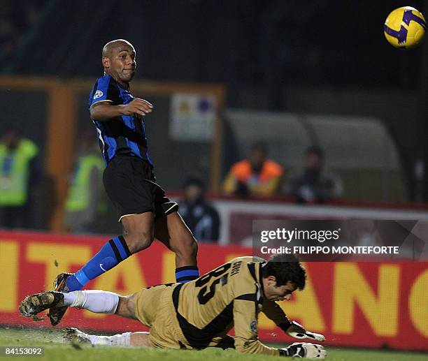 Inter Milan's Brazilian defender Maicon scores past Siena's goalkeeper Gianluca Curci during their Italian Serie A match on December 20, 2008 at...