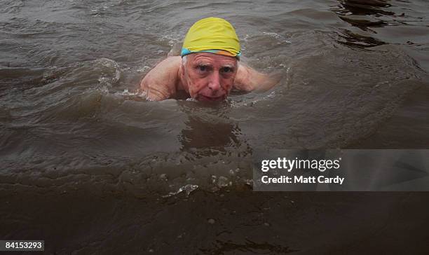 Members of the Middle Yeo Surf Lifesaving Club take part in their annual charity New Years Day swim in the Bristol Channel on January 1 2009 in...