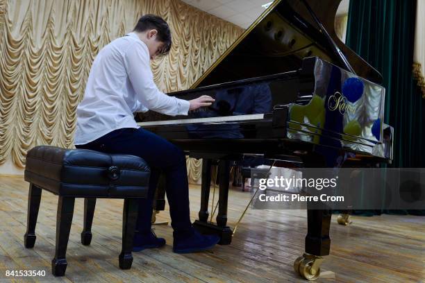 Student, pianist virtuoso, gives a concert at the Special Music School Lysenko of Kiev as the first of september traditionally marks the start of the...