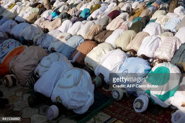 Muslims pray at the mosque during the Eid al-Adha celebrations in the district of Hotoro, in Kano, northern Nigerian, on September 1, 2017. Muslims...