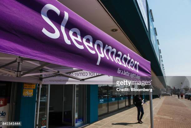 Gazebo advertises 'a better night's sleep' outside the entrance to a Sleepmasters store, operated by Steinhoff International Holdings NV, in...