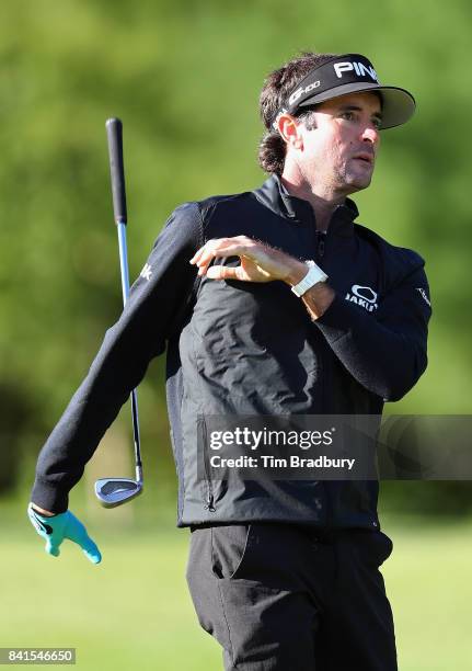 Bubba Watson of the United States drops his club as he plays a shot on the tenth hole during round one of the Dell Technologies Championship at TPC...