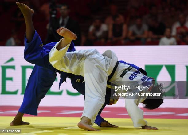France's Marie Eve Gahie competes with Democratic Peoples Republic of Korea's Sun Yong Kwon during their match in the womens -70kg category at the...