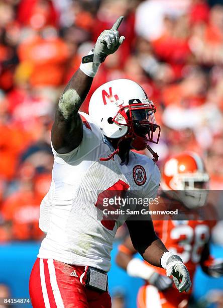 Larry Asante of the Nebraska Cornhuskers celebrates a recovered turnover during the Konica Minolta Gator Bowl against the Clemson Tigers at...