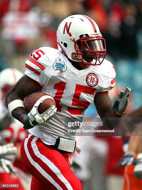 Alfonzo Dennard of the Nebraska Cornhuskers runs for yardage during the Konica Minolta Gator Bowl against the Clemson Tigers at Jacksonville...