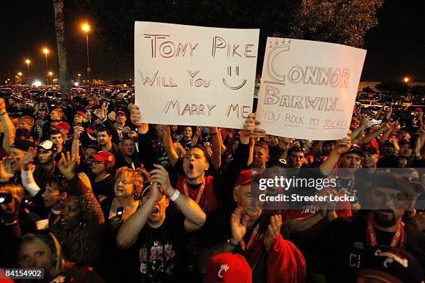 Fans cheers outside before the Virginia Tech Hokies take on the Cincinnati Bearcats in the FedEx Orange Bowl at Dolphin Stadium on January 1, 2009 in...