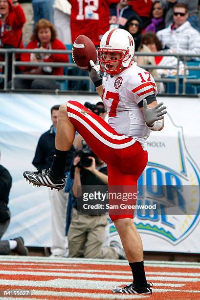 Todd Peterson of the Nebraska Cornhuskers celebrates a touchdown reception during the Konica Minolta Gator Bowl against the Clemson Tigers at...