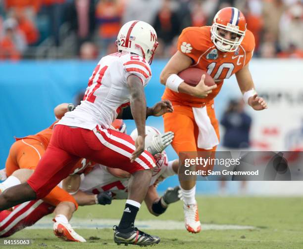 Cullen Harper of the Clemson Tigers scrambles for yardage during the Konica Minolta Gator Bowl against the Nebraska Cornhuskers at Jacksonville...