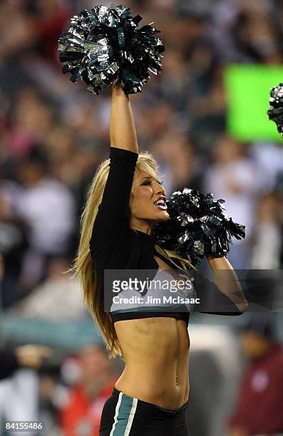 Cheerleader of the Philadelphia Eagles entertains the crowd after a touchdown against the Dallas Cowboys on December 28, 2008 at Lincoln Financial...