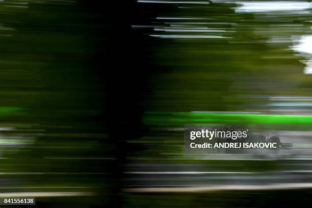Haas F1's French driver Romain Grosjean drives during the second practice session at the Autodromo Nazionale circuit in Monza on September 1, 2017...