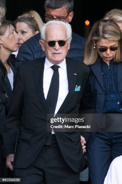 Philippe Labro and wife Francoise Coulon attend actress Mireille Darc's Funerals at Eglise Saint-Sulpice on September 1, 2017 in Paris, France.