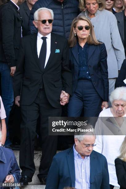 Philippe Labro and wife Francoise Coulon attend actress Mireille Darc's Funerals at Eglise Saint-Sulpice on September 1, 2017 in Paris, France.